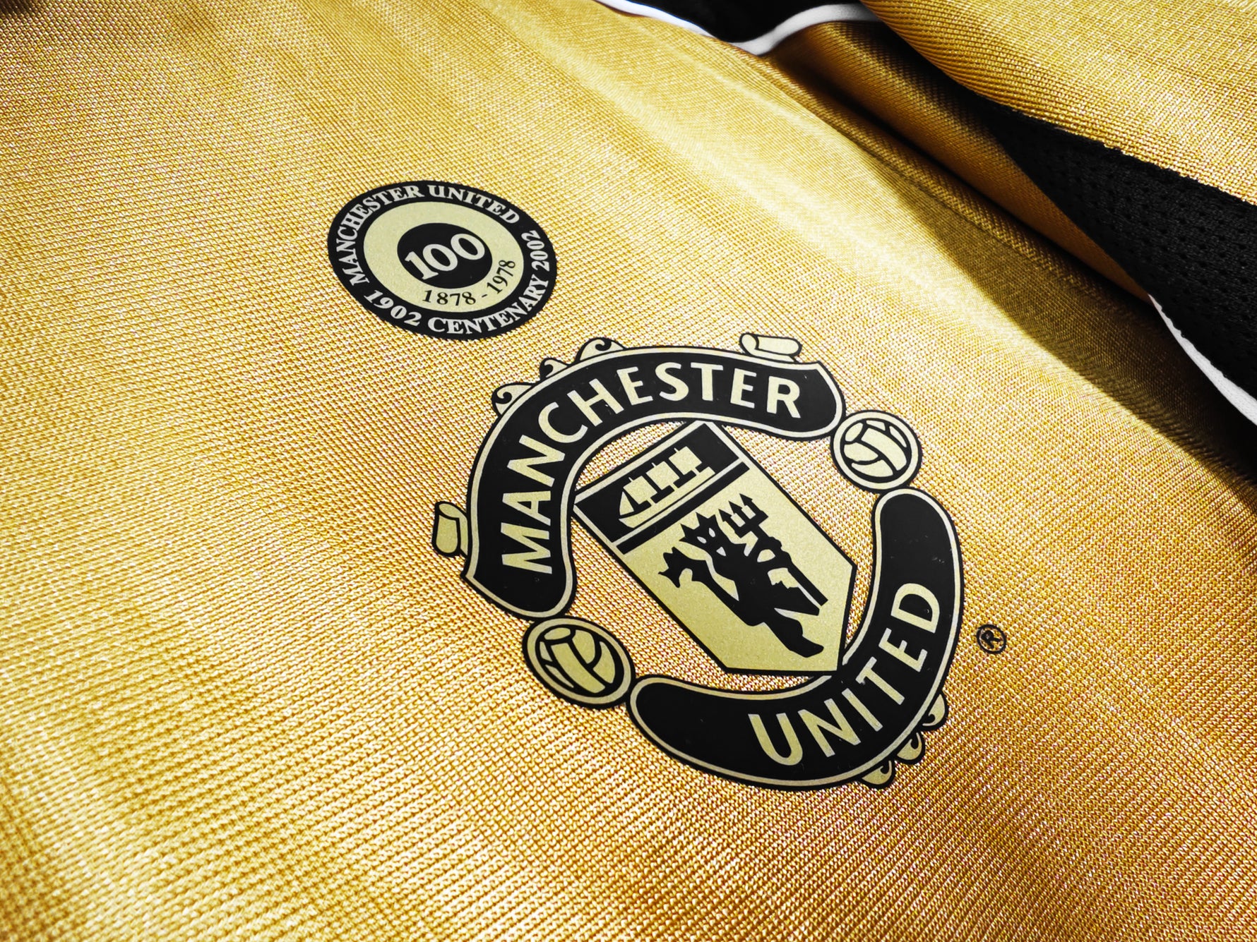 MANCHESTER UNITED 01/02 CENTENARIO (REVERSIBLE)